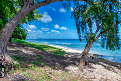 Beautiful tropical island beach with sun.