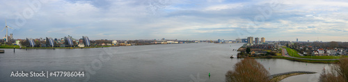 Panoramic view of rivers Nieuwe Maas and Hollandsche IJssel from Brienenoord bridge, Rotterdam photo