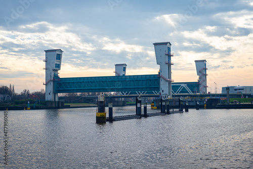 Storm surge barrier in river Hollandsche IJssel, near Rotterdam, The Netherlands. Part of the famous Dutch delta works. photo