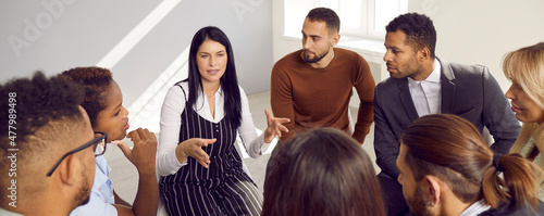 Foto Narrow banner of diverse multiracial businesspeople in circle talk brainstorm over company business ideas together