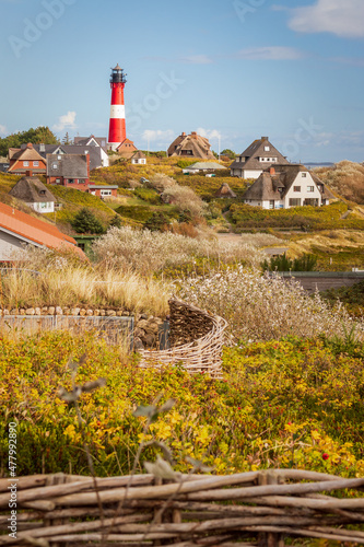 Lighthouse and dwellings at Hörnum, Sylt - Hilly part of the north sea village of Hörnum photo