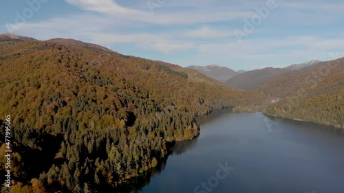 Lake in the mountains from a bird's eye view. Mountain lake in autumn.