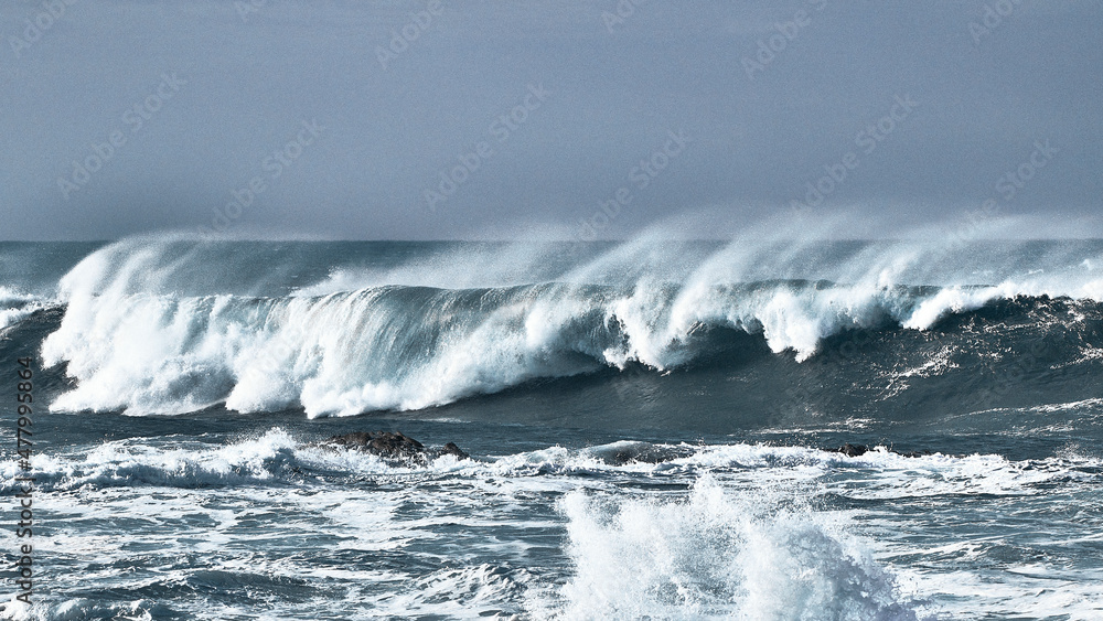 waves crashing on the rocks