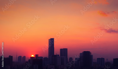 Sunset over city. Keangnam tower under the sunset. Hanoi skyline. 