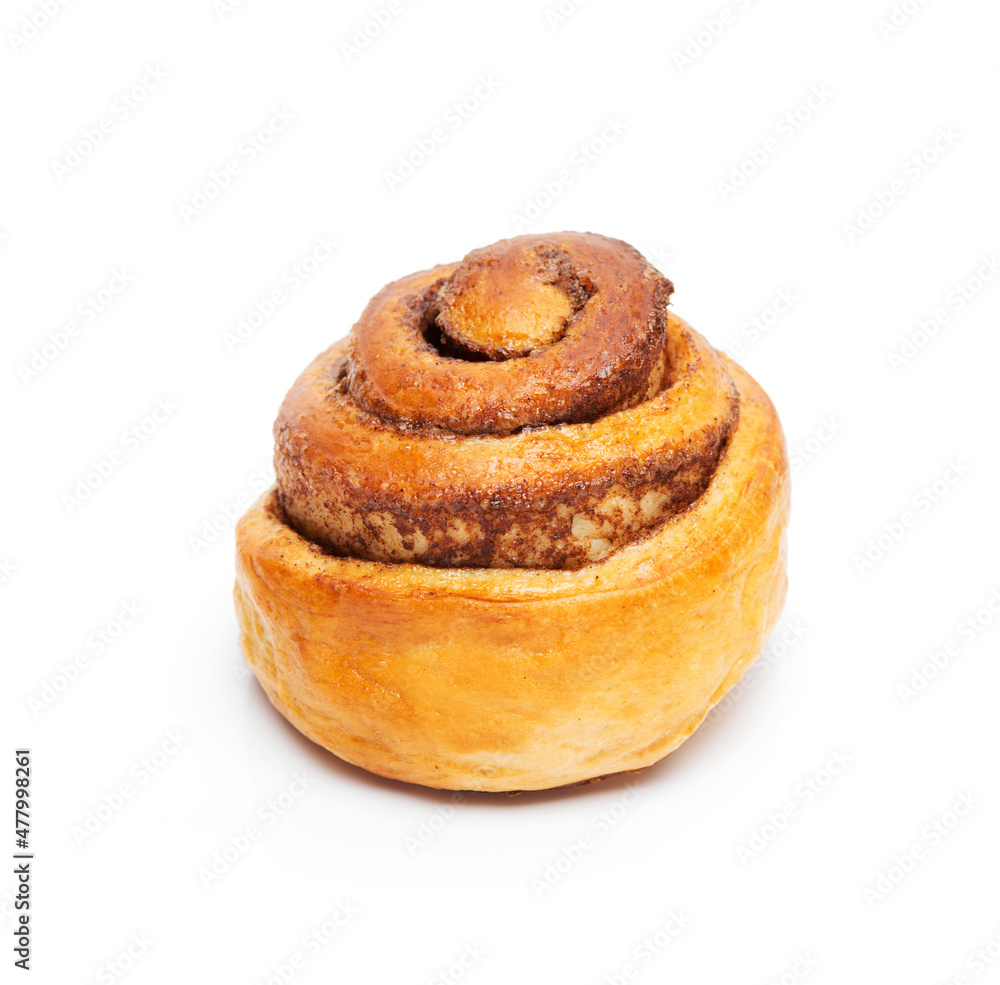 Homemade cinnamon bun isolated on a white background Homemade cinnamon bun isolated on a white background