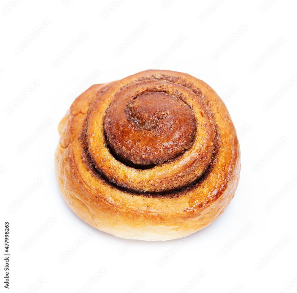 Homemade cinnamon bun isolated on a white background Homemade cinnamon bun isolated on a white background