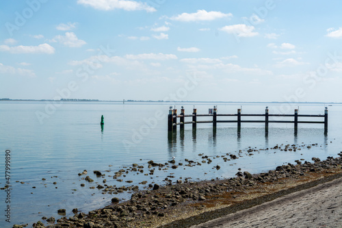 Walks along shoreline and beaches of Oesterschelde near Yerseke at low tide  Zeeland  Netherlands