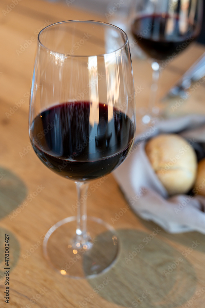 Glass of dry red wine served in cafe Glass of dry red wine served in cafe