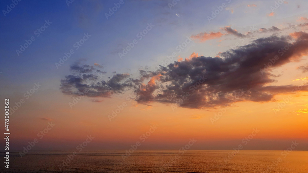 Sunset of sea beach and colorful sky background.