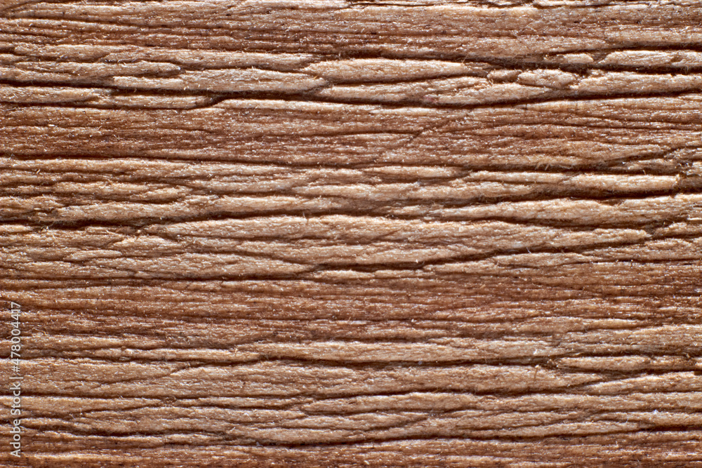 Texture of a wooden surface of beige color close-up Texture of a wooden surface of beige color close-up