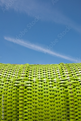 green basket on the beach