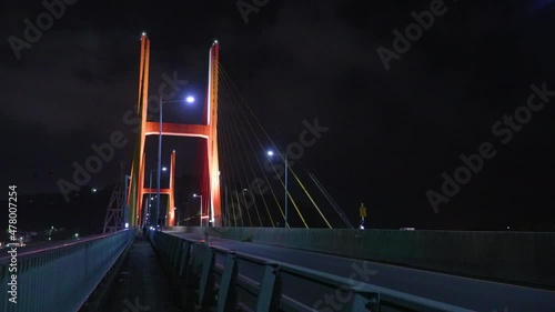 Night view of geobukseon bridge, Yeosu, South Korea photo