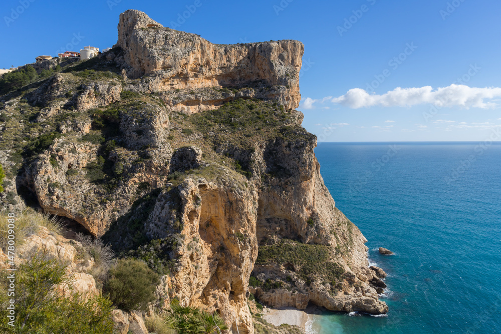 cliffs and beautiful beach on the Mediterranean coast in Spain travel destination Costa Blanca