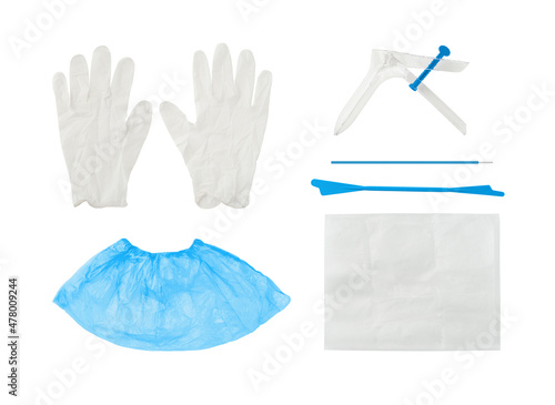 Flatlay of gynecology set with vaginal speculum, spatula, cytobrush and other instruments for medical screening photo