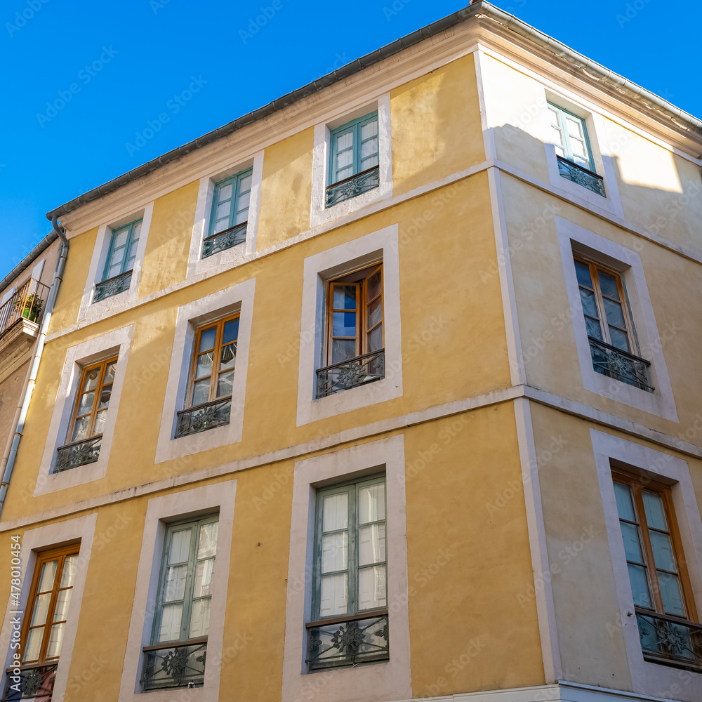 Fototapeta premium Nimes in France, old facades in the historic center, typical buildings 