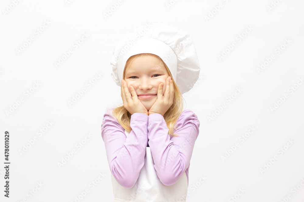 Beautiful little girl in chef uniform isolated on white Beautiful little girl in chef uniform isolated on white