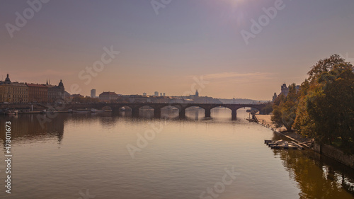 River Vltava with bridges and a boat on the surface in the city of Prague in the Czech Republic © Roman Bjuty