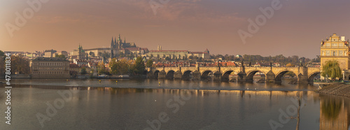 The panorama of the city of Prague overlooking the Vltava River and the Charles Bridge to the Czech Republic