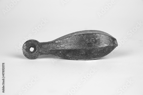 old fishing sinker, Fishing weight isolated on white background  photo