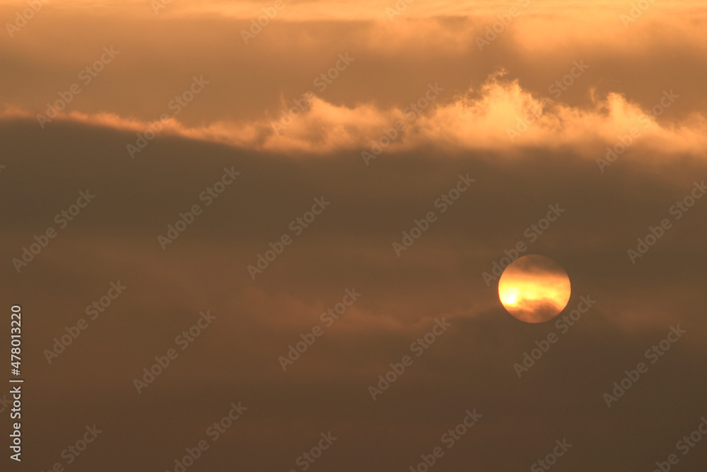 Colorful sun at sunrise over the sea in southern Spain Colorful sun at sunrise over the sea in southern Spain