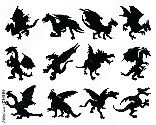 Black silhouettes of dragons on a white background 