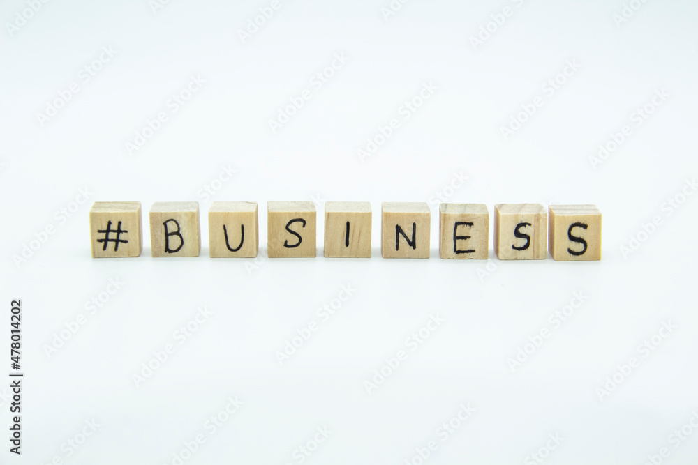 Word Business written on the wood cubes on white background. The concept photo with letters #business Word Business written on the wood cubes on white background. The concept photo with letters #business