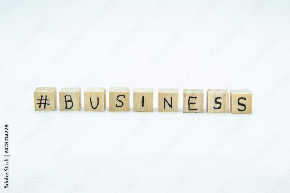 Word Business written on the wood cubes on white background. The concept photo with letters #business Word Business written on the wood cubes on white background. The concept photo with letters #business