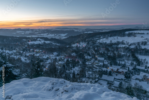 View near Tisa village in winter snowy morning before sunrise