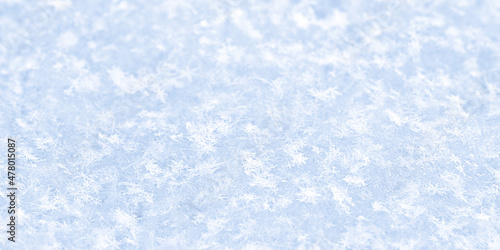 Wallpaper Mural blue snowfall bokeh background, abstract snowflake background on blurred abstract blue Torontodigital.ca