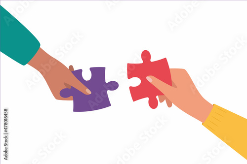 Hands assembling puzzle pieces together. Vector illustration.