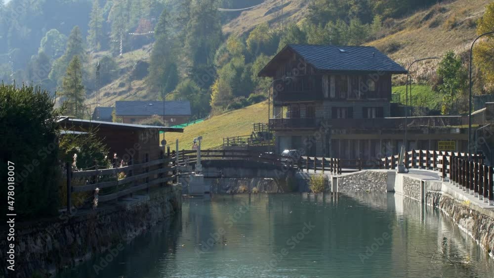 Typical mountain landscape. Water channel taken from the source with wooden house. Video 4K Typical mountain landscape. Water channel taken from the source with wooden house. Video 4K