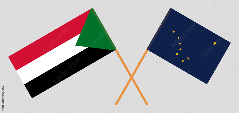 Crossed flags of the Sudan and the State of Alaska. Official colors. Correct proportion Crossed flags of the Sudan and the State of Alaska. Official colors. Correct proportion