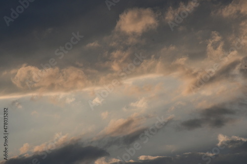 evening sky Shadows of clouds that are shattered by the orange sunlight © Siripat