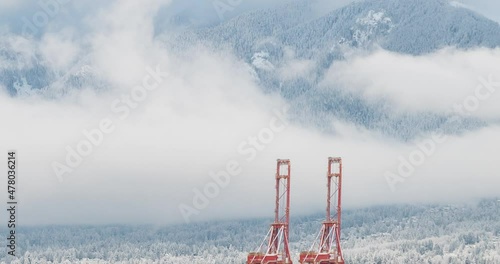 Timelapse video of snowy mountain range during a cloudscape in Vancouver, Canada