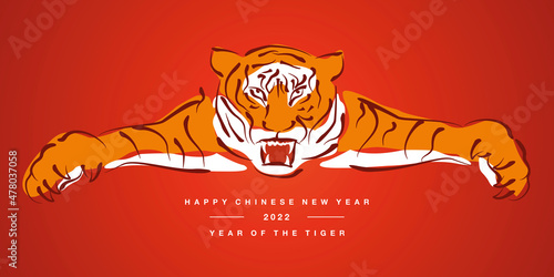 Happy New Year 2022 year of the tiger red white orange drawing of an angry tiger chinese new year greeting card © simbos