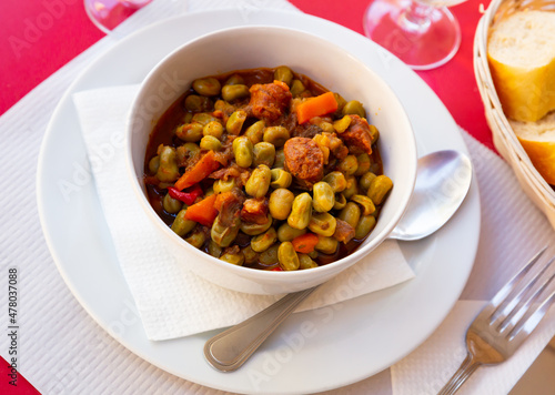 Habas a la catalana, traditional Spanish bean stew with ham and black catalan sausage