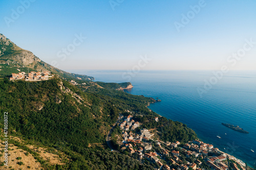 Aerial view of the red roofs of houses of the old town by the sea