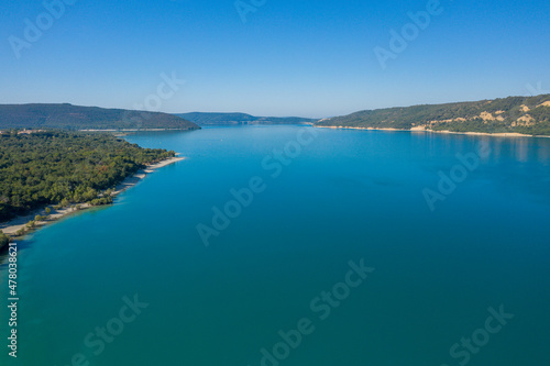 The Lac de Sainte-Croix in the middle of forests and mountains in Europe, France, Provence Alpes Cote dAzur, Var, in summer, on a sunny day.