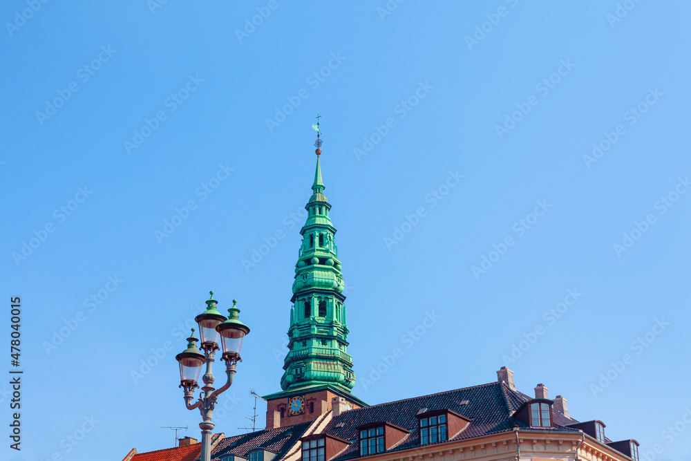 Borsen spire famous architecture in Copenhagen Denmark . 17th-century building with a striking spire.
