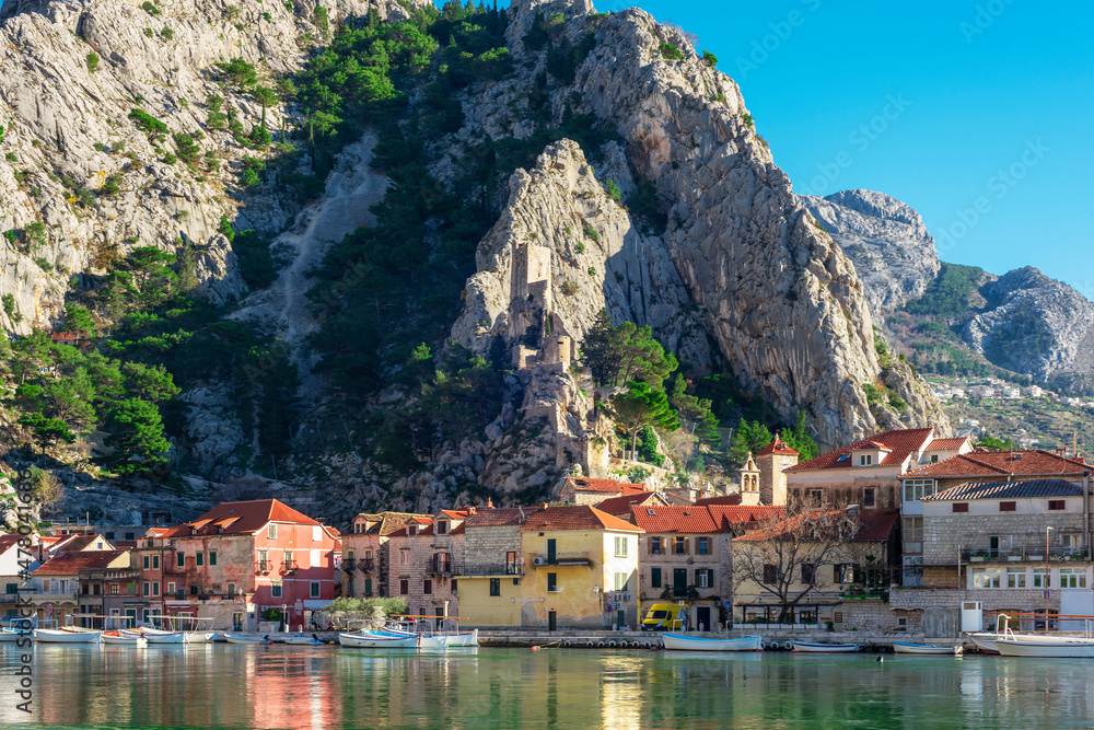 Beautiful view of Omis town at the foot of the mountain, Dalmatia, Croatia