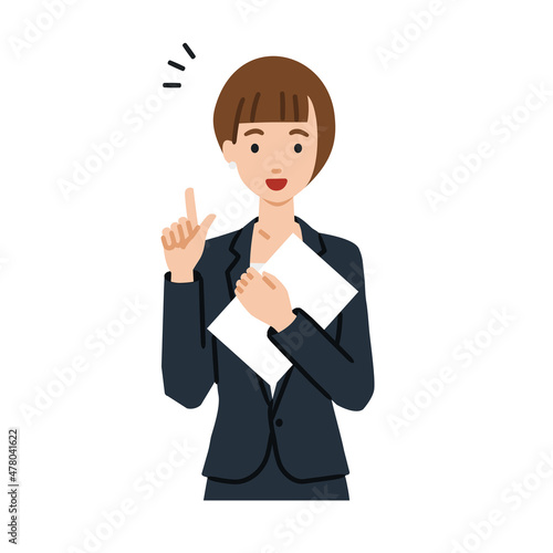 立って書類を手に持って何かひらめいたスーツの女性