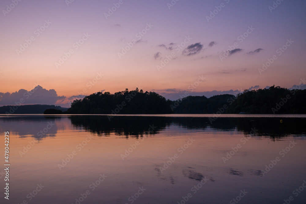 The banks of Lac des Settons at sunset in Europe, France, Burgundy, Nievre, Morvan, in summer.