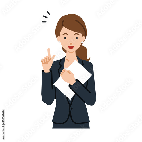 立って書類を手に持って何かひらめいたスーツの女性