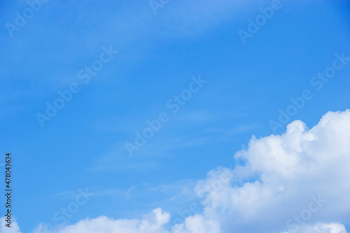 Blue sky background and white clouds soft focus  and copy space horizontal shape.