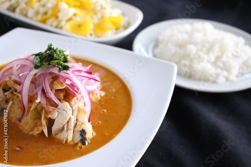 Comida tradicional de Ecuador, encebolllado, sopa de bolas de verde, tigrillo photo