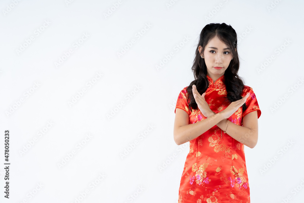 beauty woman wear cheongsam and smile to you in chinese new year