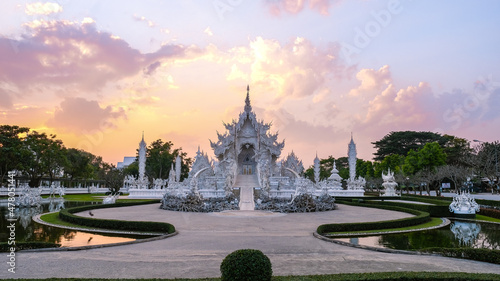 Fényképezés Chiang Rai Thailand, white temple Chiangrai during sunset, Wat Rong Khun, aka The White Temple, in Chiang Rai, Thailand