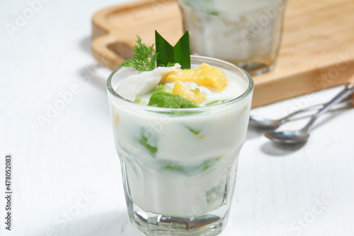 Ice teler or es teler-indonesian fruit cocktail,Avocado, young coconut, jackfruit, served with coconut milk, sweetened condensed milk.