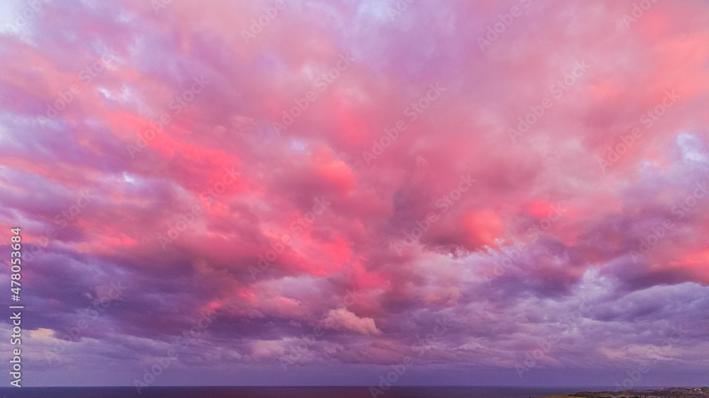 Stylized Drone shot of Minnamurra Mystics Beach Sunset Clouds Shellharbour Australia