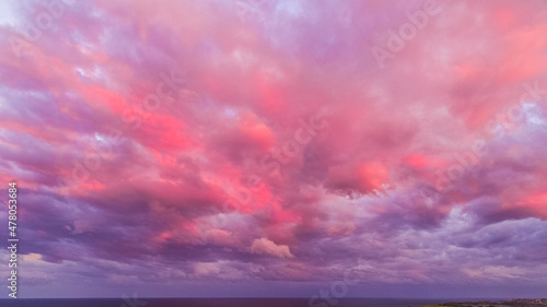 Stylized Drone shot of Minnamurra Mystics Beach Sunset Clouds Shellharbour Australia